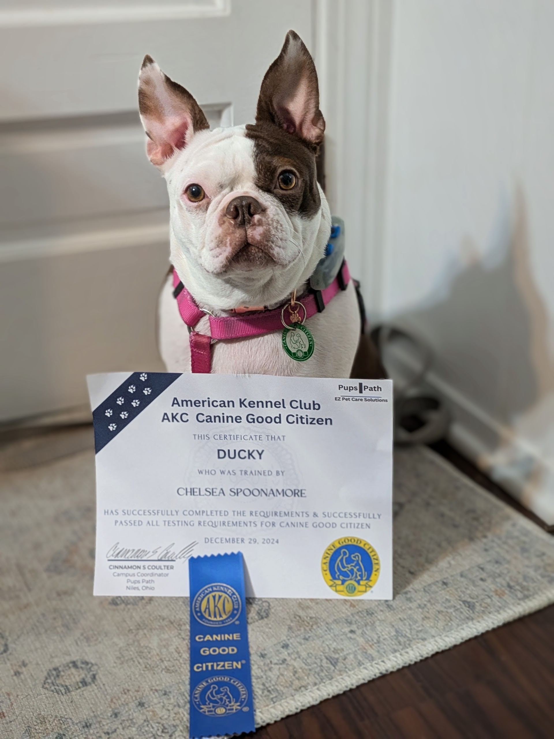 Ducky with her certificate