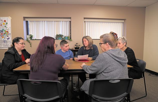 Meeting with mother and child and school admin