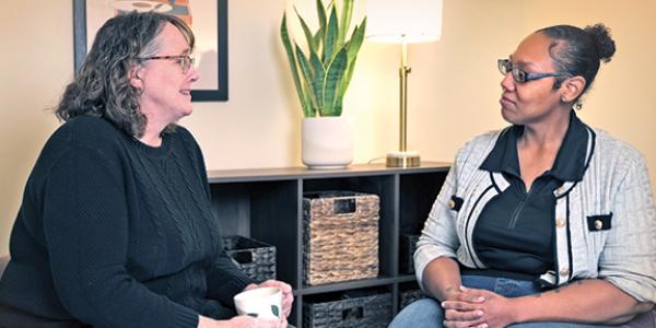 female therapist with female client in counseling setting